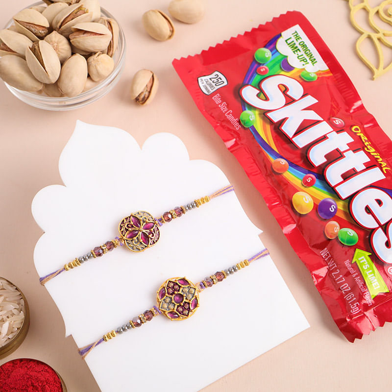 Set Of Two Floral Rakhis With Candy N Nuts