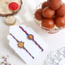 Set Of Two Floral Rakhis With Gulab Jamun Box