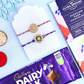 Set Of Two Vibrant Rakhis With Choco Treats