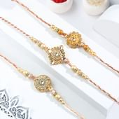 Shimmering Peach N Gold Rakhi Trio