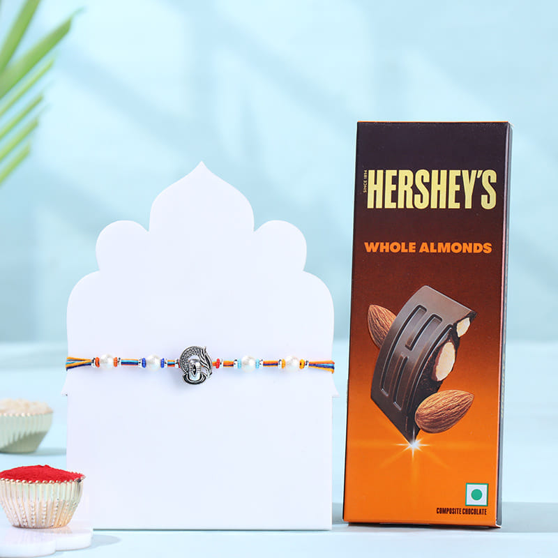 Shivling Pearls Rakhi With Chocolate Bar