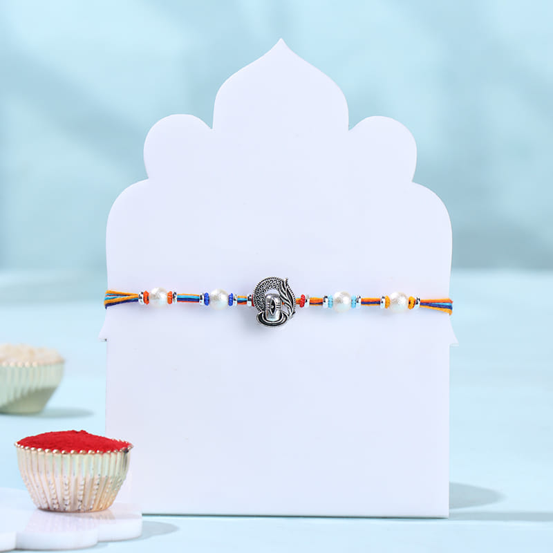 Shivling Pearls Rakhi With Trail Mix N Raisins