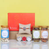 Siblingship Signature Box - One Metal Rakhi with Roli and Chawal and Cashews and Almonds and Raisins and One Floweraura Signature Box