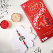 Silver Charm Rakhi And Lindt Chocolate