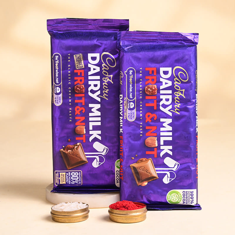 Silver Charm Rakhi Trio With Cadbury Bars