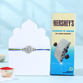 Silver Floral Rakhi With Hersheys Choco Bar