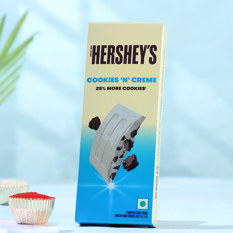 Silver Floral Rakhi With Hersheys Choco Bar