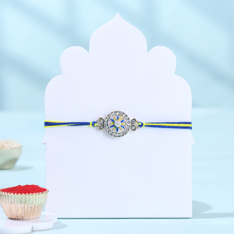 Silver Floral Rakhi With Savoury Dryfruits