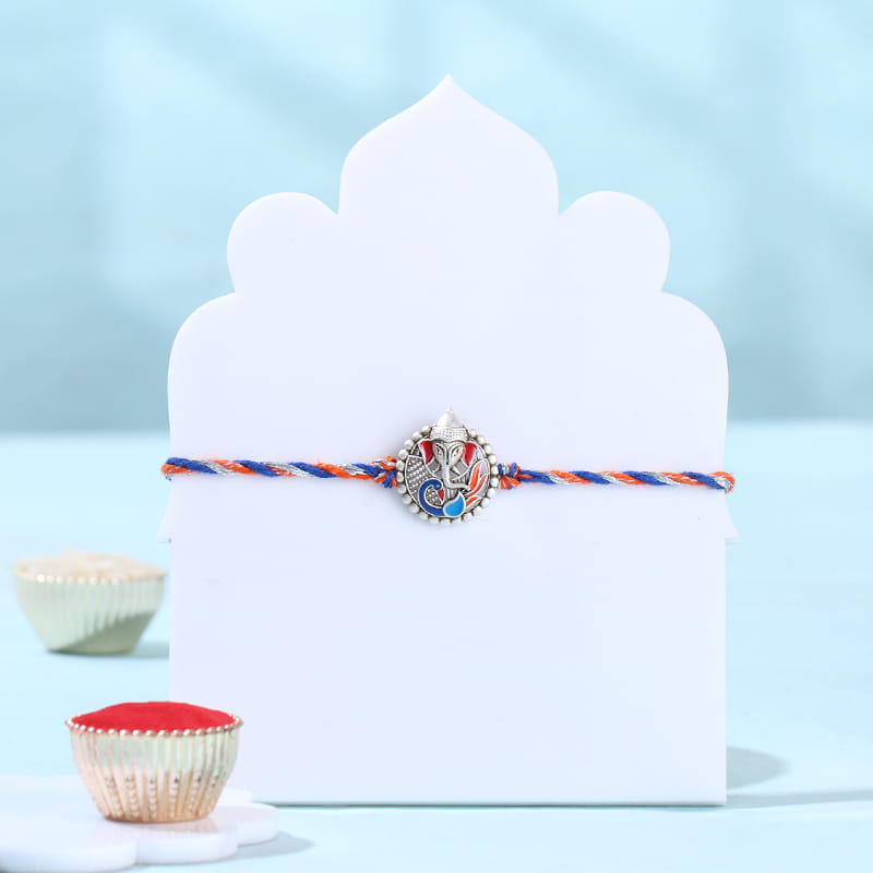 Silver Ganehsa Rakhi With Gourmet Snacks