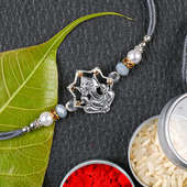 Pure silver rakhi in Silver Ganesha Beads Rakhi
