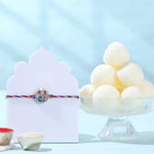 Silver Ganesha Rakhi With Rasgullas