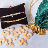 Silver Golden Nut Rakhi Combo - Set of 2 Designer Rakhi with Complimentary Roli and Chawal and 100gm Cashews in Green Potli