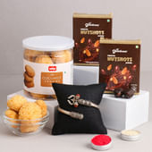 Silver Om Rakhi With Cookies And Choco Almond
