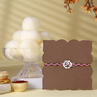 Silver Om Rakhi With Rasgullas
