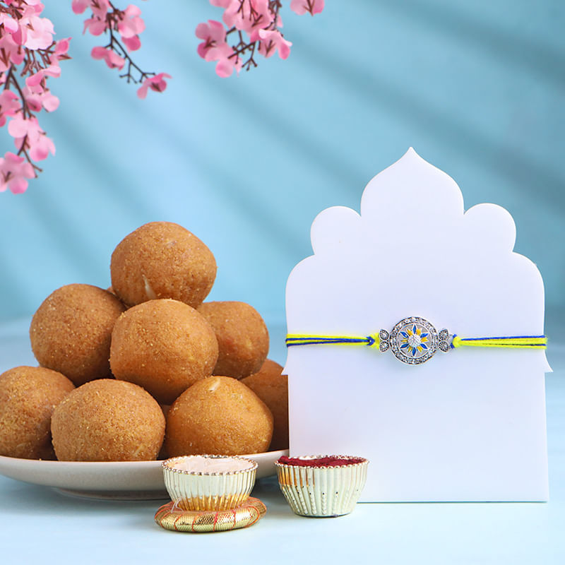 Silver Stone Rakhi With Besan Ladoos