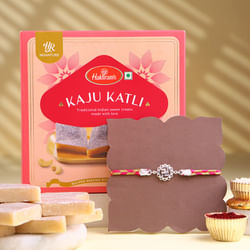 Silver Swastik Rakhi With Kaju Katli