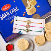 Soan Cakes With Floral Rakhi Trio