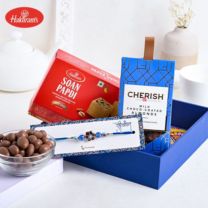 Buy One Blue Beaded Rakhi Online - Uttar Pradeshi Soan Papdi N Tasty Chocolate Almonds With Blue Beaded Rakhi