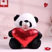 Soft cuddly panda holding a shiny red heart (20 cm)