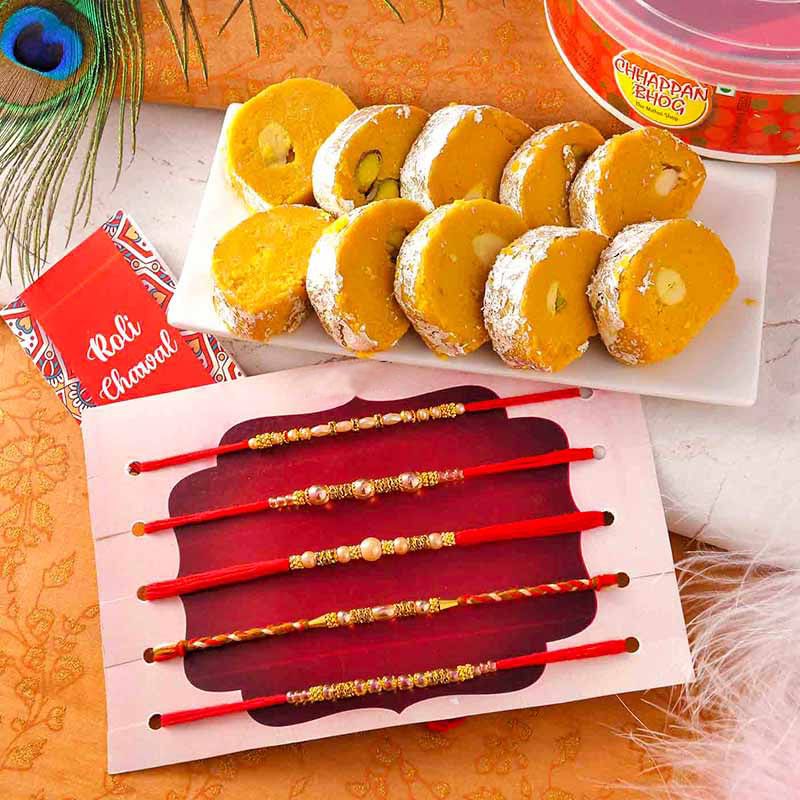 4 Sets Rakhi - Something For All Combo to UAE