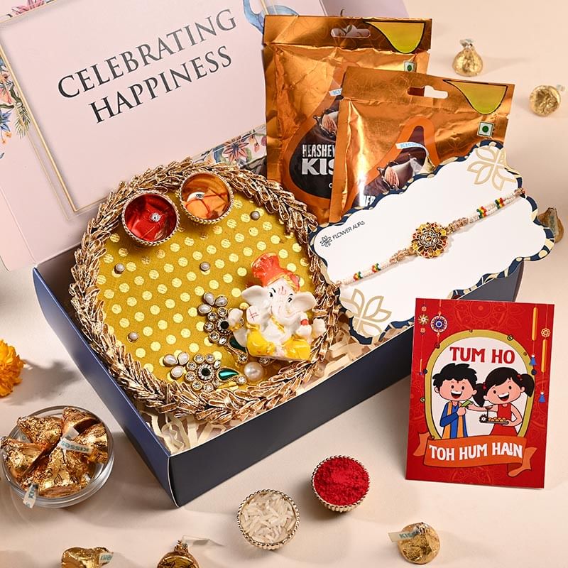 Sparkling Kundan Rakhi With Ganesha Idol N Tikka Thali