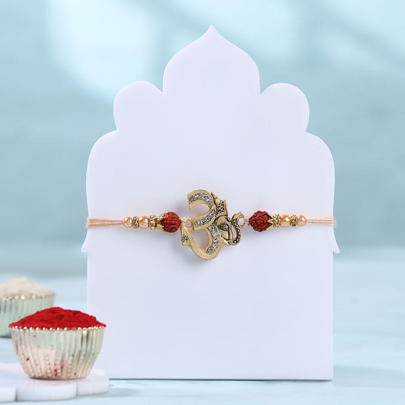 Sparkling Om Rakhi With Trail Mix N Almonds-Overseas