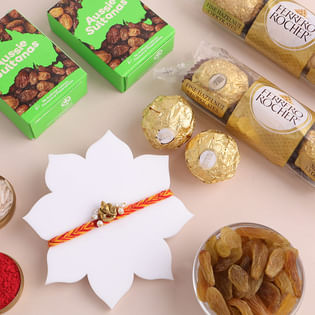 Spiritual Ganesha Mauli Rakhi With Sweet Delights