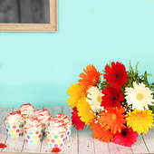 Sprinkled Delicacy Combo - Bunch of 12 Mixed Gerberas with 6 Red Velvet Cup Cakes
