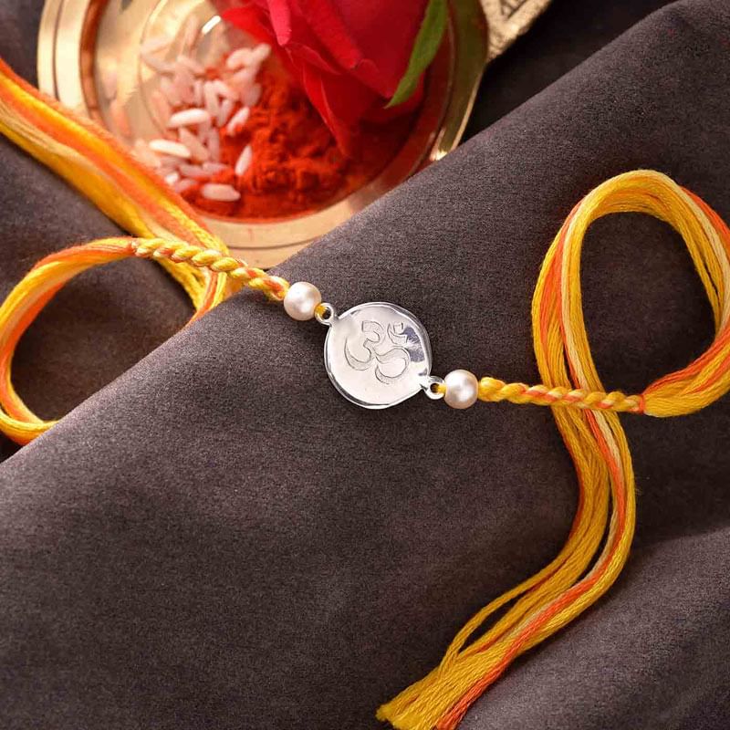 Sterling Om Charm Rakhi - A Silver Rakhi Full view