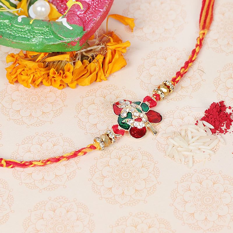 Stone Embedded OM Rakhi