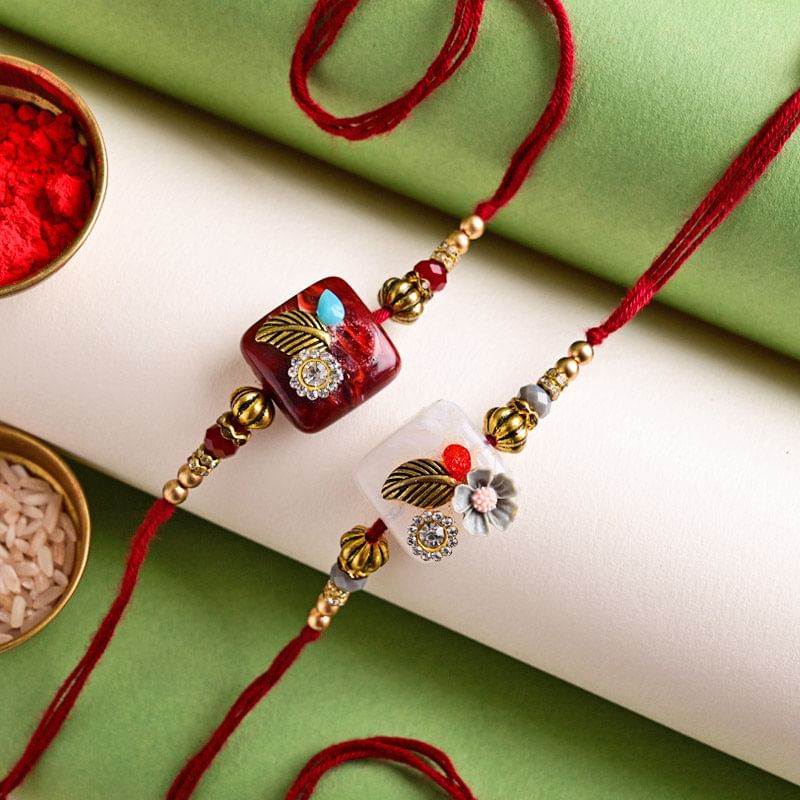 Send Fancy rakhi For Brother Online - Stone Floral Rakhi