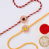 Stone Studded Metal Daisy Rakhi Set of 2