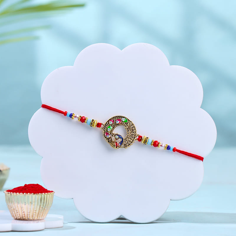 Stone Studded Floral Rakhi With Gourmet Treats