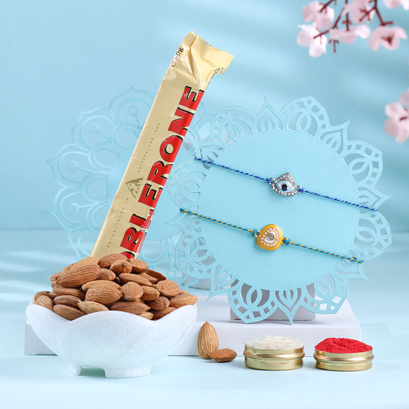 Studded Evil Eye Rakhi Duo With Nuts N Chocolate