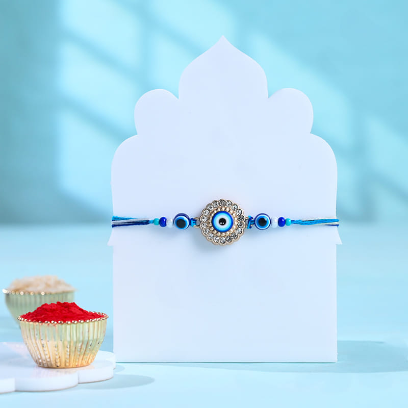 Studded Evil Eye Rakhi With Kaju Katli