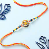 Yellow And Blue Beaded Kundan Rakhi With Kaju Katli