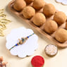 Studded Peacock Rakhi With Besan Ladoos