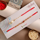 Send Stunning Garnished Couple Rakhi Online For Bhaiya bhabhi