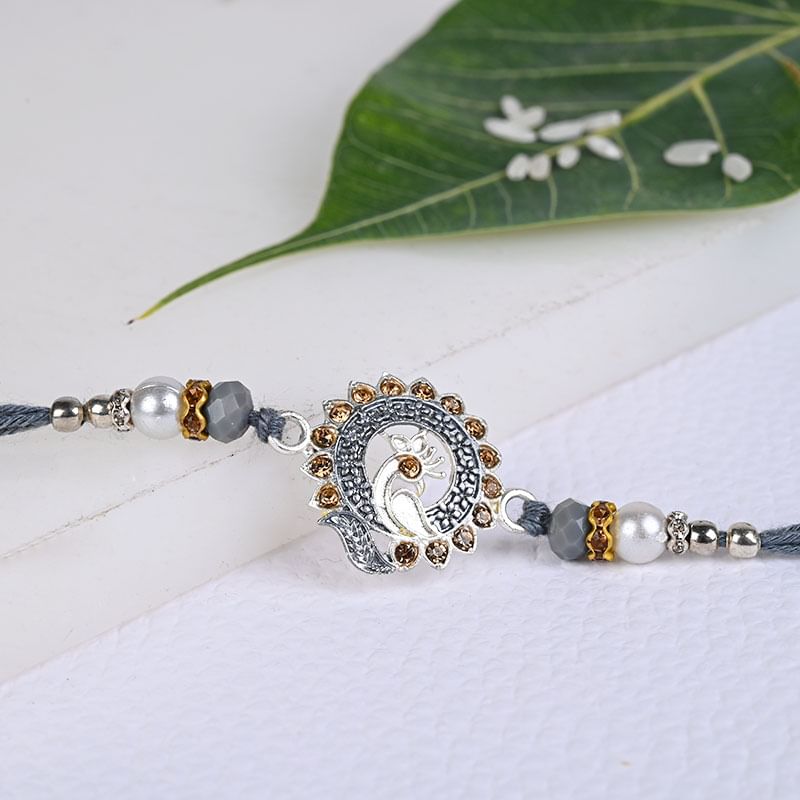 Stunning Silver Peacock Rakhi - Peacock silver rakhi