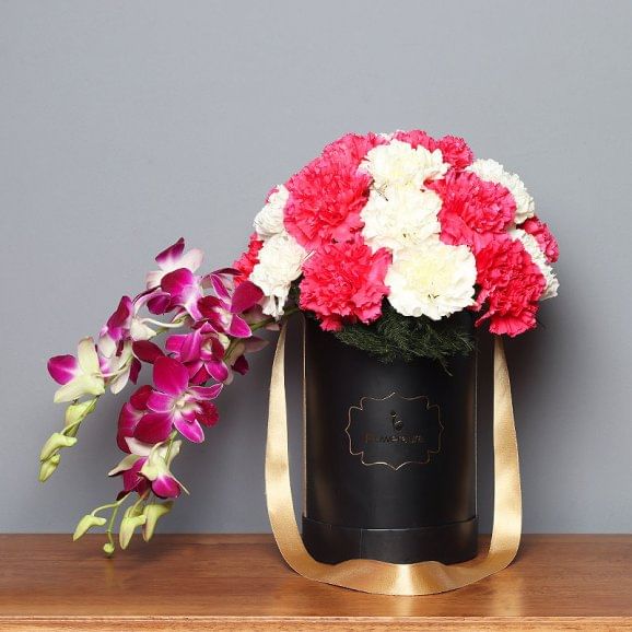 Bunch of Carnations and Orchids in a Flower Box