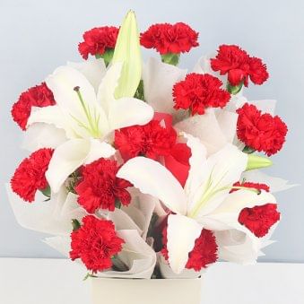 12 Red Carnations and 2 Lilies with Zoomed in View