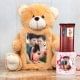 Brown teddy with anniversary frame alongwith cadbury and mug 