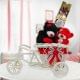 A combo of 2 teddies a pack of 4 Ferrero Rocher and an adorable miniature cycle