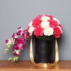 Bunch of Carnations and Orchids in a Flower Box