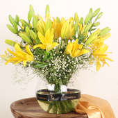 Sunkissed Lily Miss - Arrangement of 10 Yellow Lilies in Round Vase