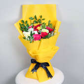 Sunkissed Wrapped Smiles - Bouquet of 19 Mixed Flowers in Golden and Yellow Paper Packing