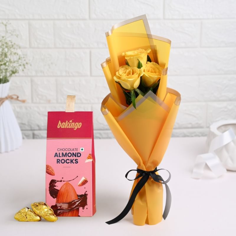 Sunshine Glow Yellow Roses With Almond Rocks