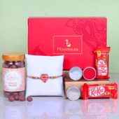 Super Choco Rakhi Hamper - One Designer Rakhi with Roli and Chawal and Choco Raisins and 2 Nestle Kitkats - 12gm each and One Floweraura Signature Box