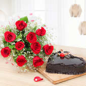 Surprising Heartilicious Combo - 10 Red roses with 1/2 kg heart shaped chocolate cake