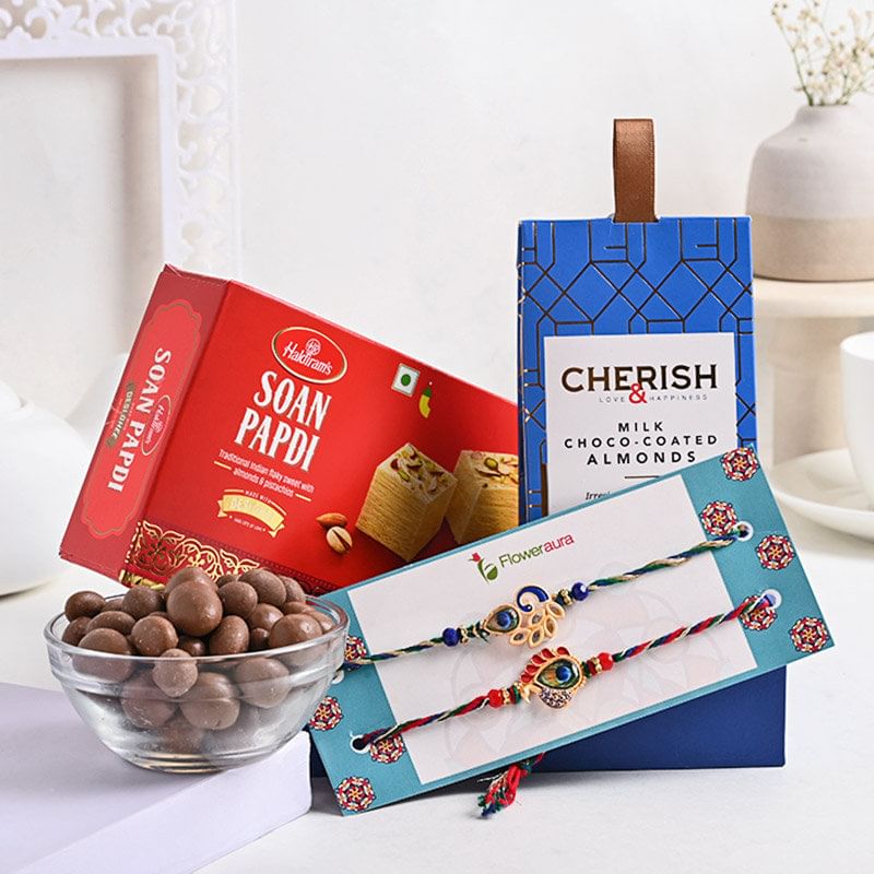 Haldiram Soan Papdi With Choco Badam N Morpankh Rakhi Duo: Set of 2 Rakhi with chocolates